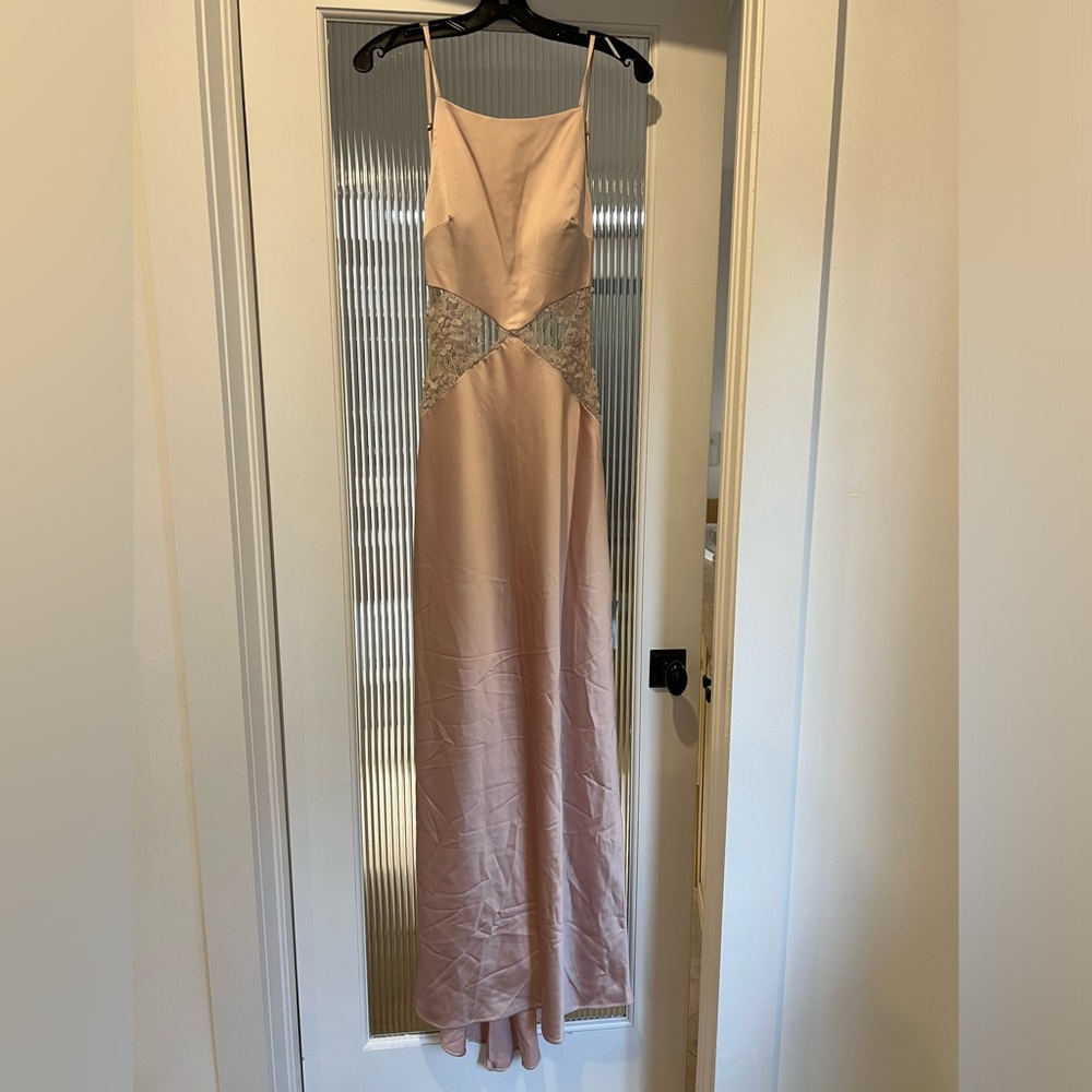María Bianca Nero pink gown with flower details on the sides
